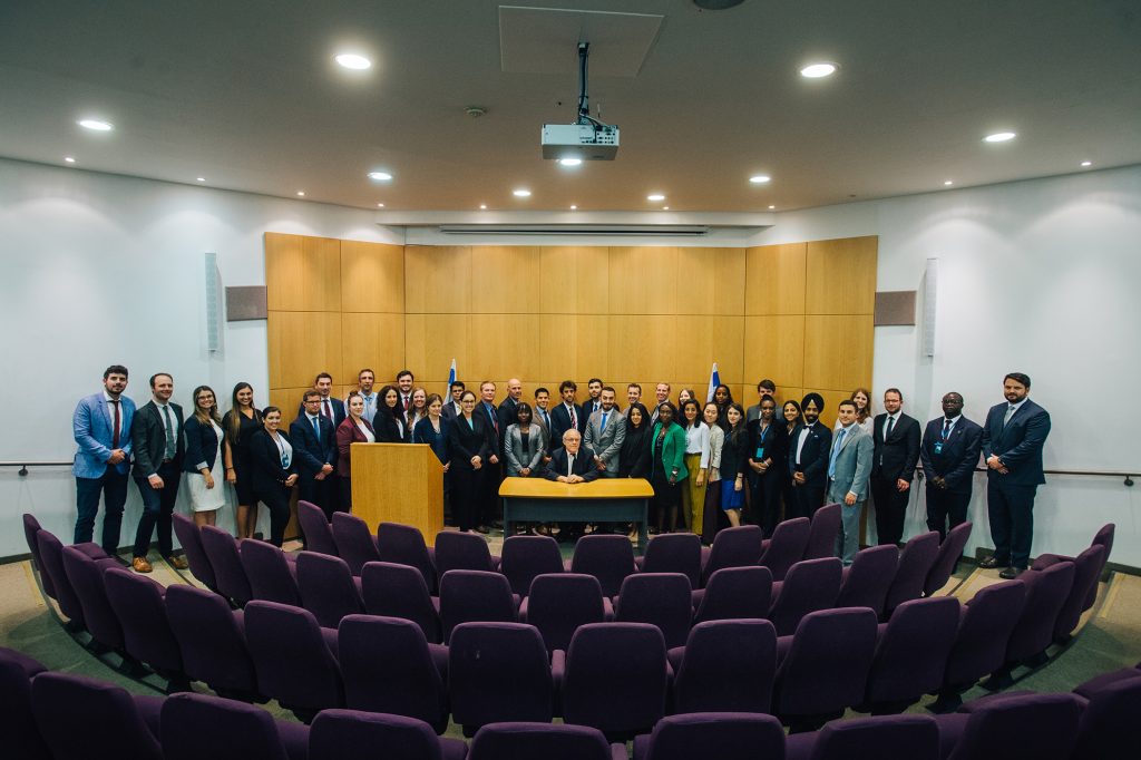 I-LAP Tour delegates receive a briefing from the Hon. Justice Neal Hendel of the Israel Supreme Court. Three South Texas College of Law Houston students participated on the international tour, exposing them to the geopolitical, military, and social challenges of the region.