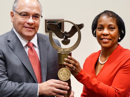 J. Ken Johnson ’86 passes the mace to Boykins